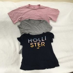 All together! Three t-shirts, different brands size xs for girls 10-12 yo
